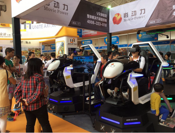 latest company news about Movie Power VR racing car has attracted media attention on the China International Games & Amusement Fair 2016  3